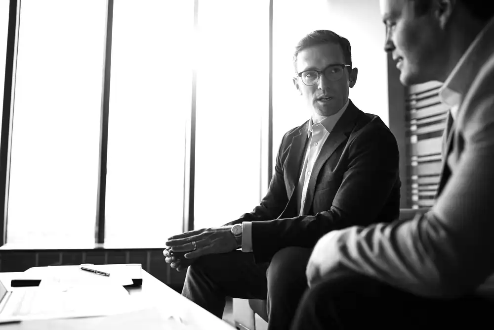 Two executives in conversation